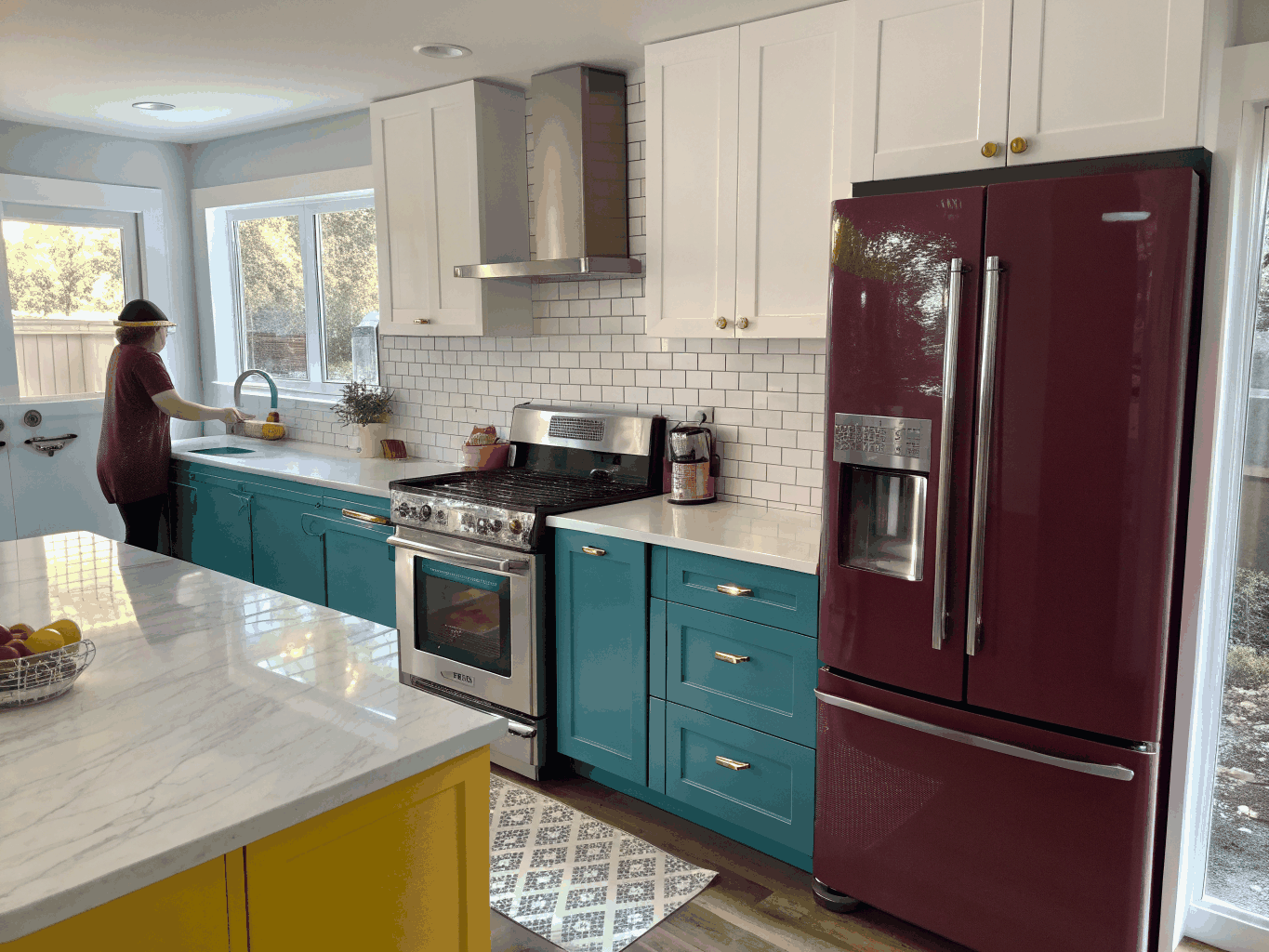 Modern Samsung kitchen suite with French door refrigerator, range, and dishwasher